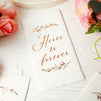 100 Pack White Napkins for Wedding Reception with Rose Gold Foil Accents, Here's To Forever, 3-Ply, 4 x 8 in