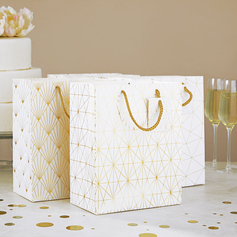 16-Pack Medium White and Gold Gift Bags with Handles & Tags for Weddings Baby Bridal Showers Birthday Party Favors, 4 Geometric Foil Designs (8 x 10 x 4.5 Inch)